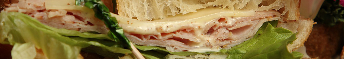 Eating Sandwich at The Big Dipper restaurant in Escalon, CA.